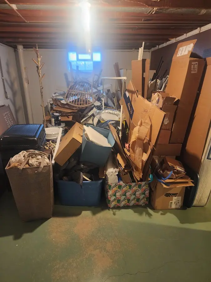 Roll-off dumpster container at job site for Concrete Dumpster Rental in East End